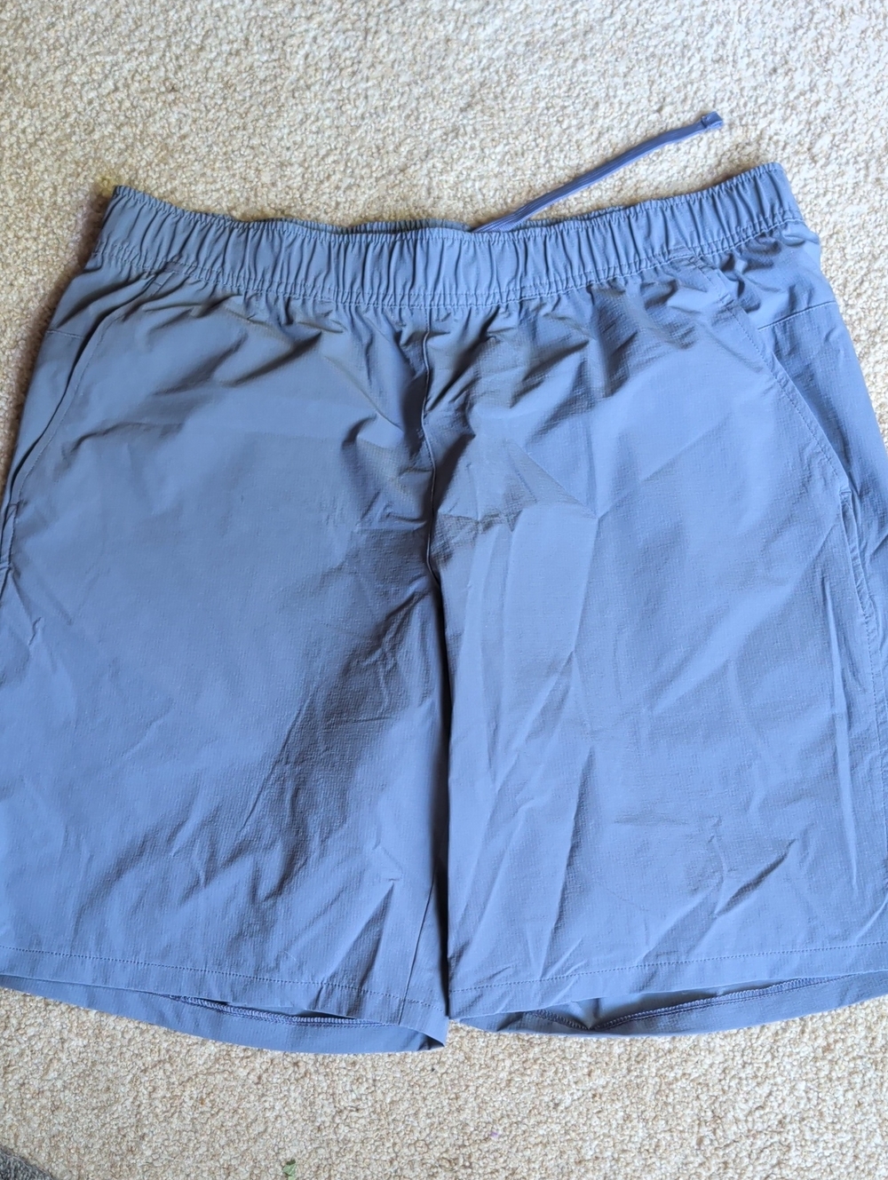 tek gear light blue athletic shorts with neon logo